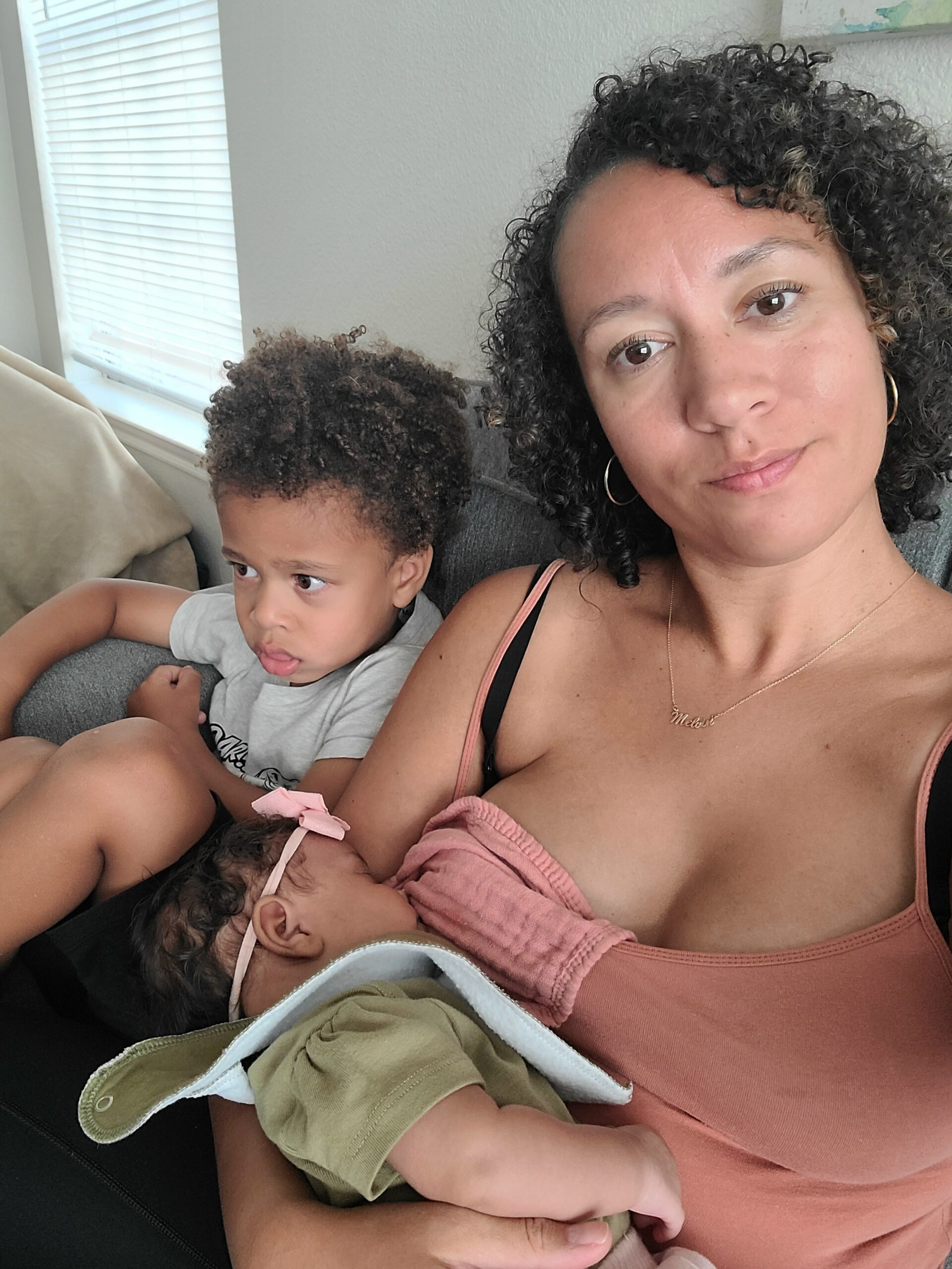 mom baby breastfeeding and toddler